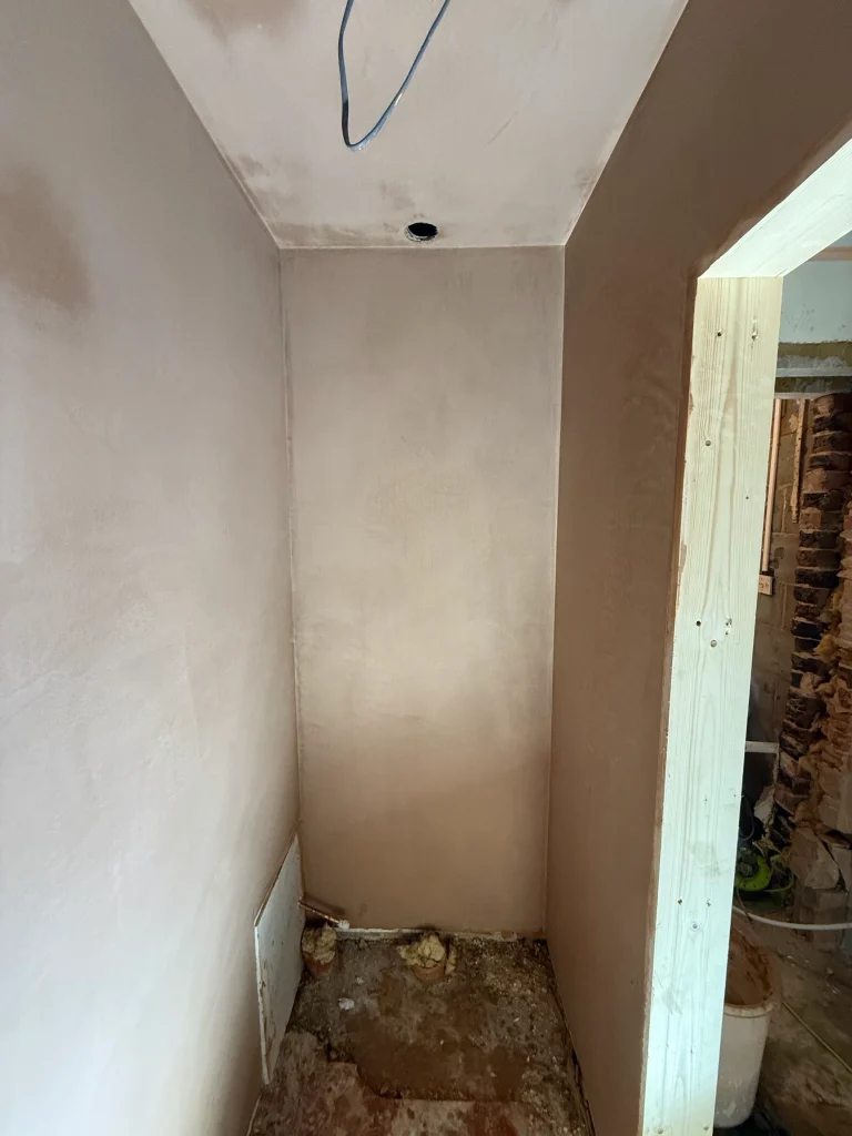 The same room skimmed, with the walls and ceiling flat and a clean edge at the doorway